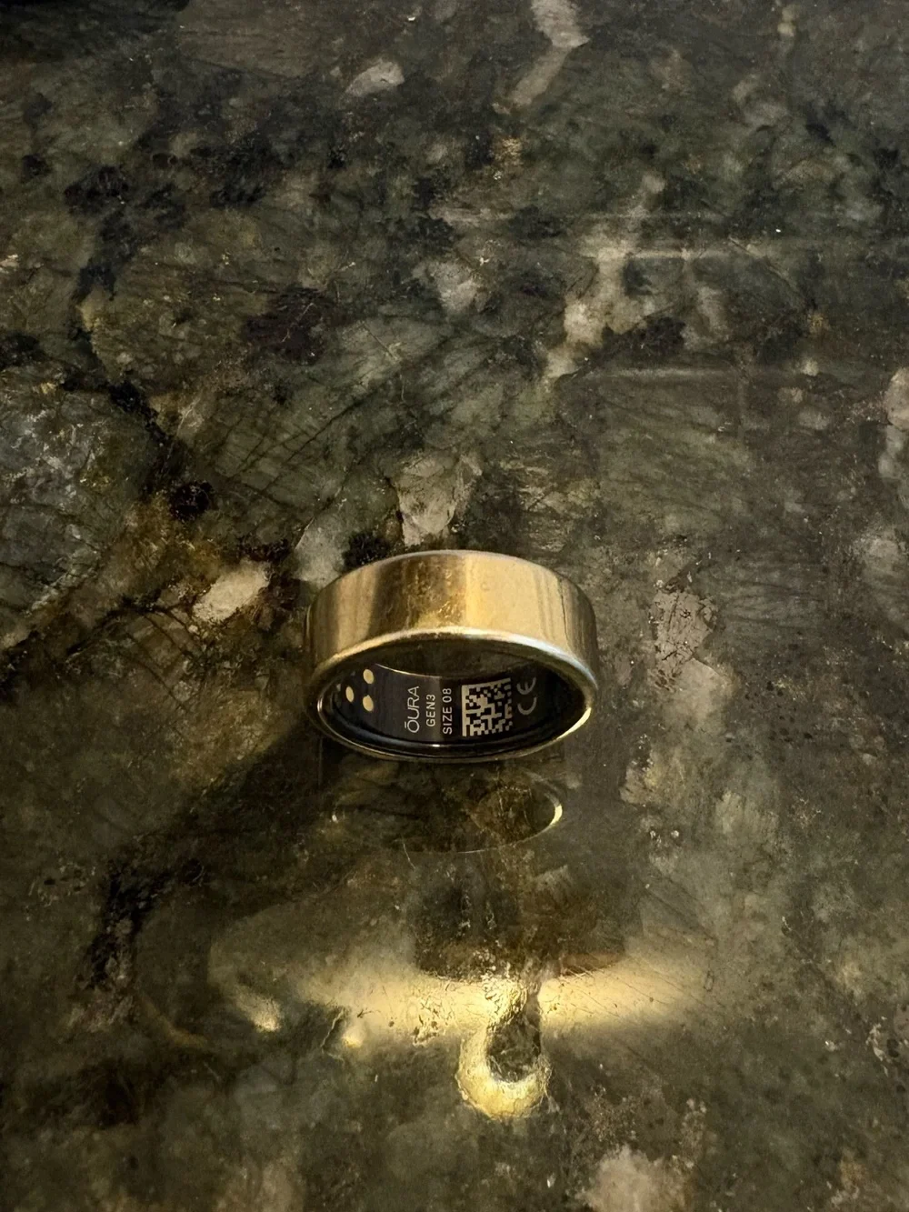 Gold Gen 3 Size 8 Oura Ring with original charger